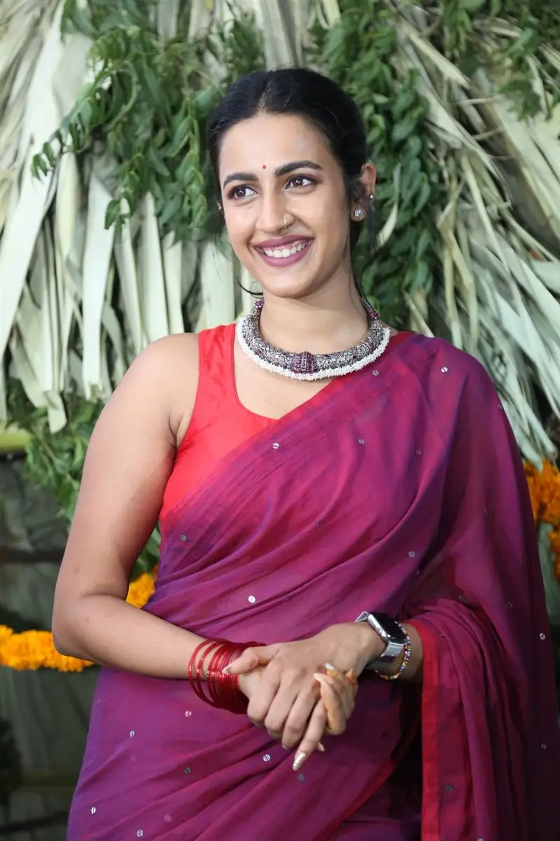 Niharika Konidela Stills in Violet Saree Sleeveless Orange Blouse